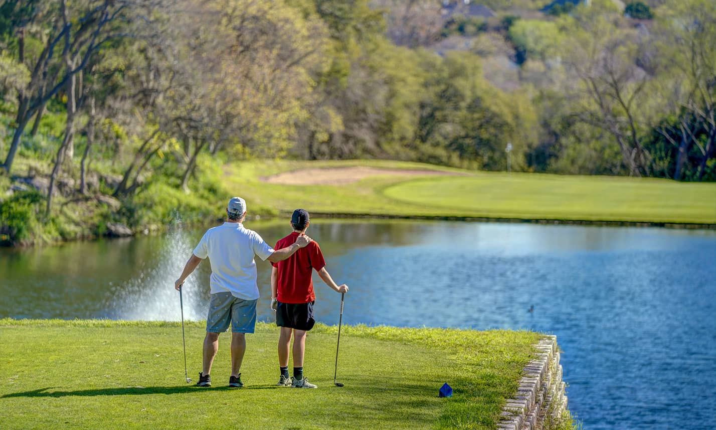 Two people on a golf course